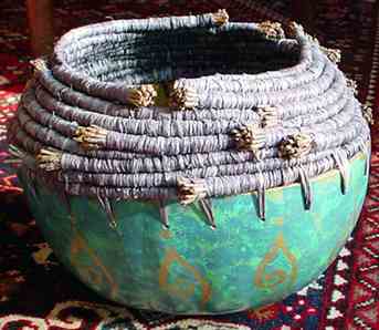 Coiled gourd of pine needles and raffia, by Nancy Latham