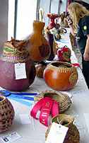 Lynn Hoyt makes notes in the Special Talents Section of the 2003 NC Gourd Festival Exhibits