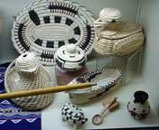 Tohono Oodham effigy baskets and a very rare centipede and snake basket